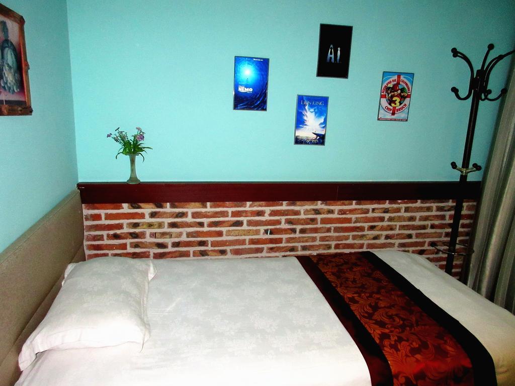 25°C Four Season Youth Hostel تشينغداو الغرفة الصورة