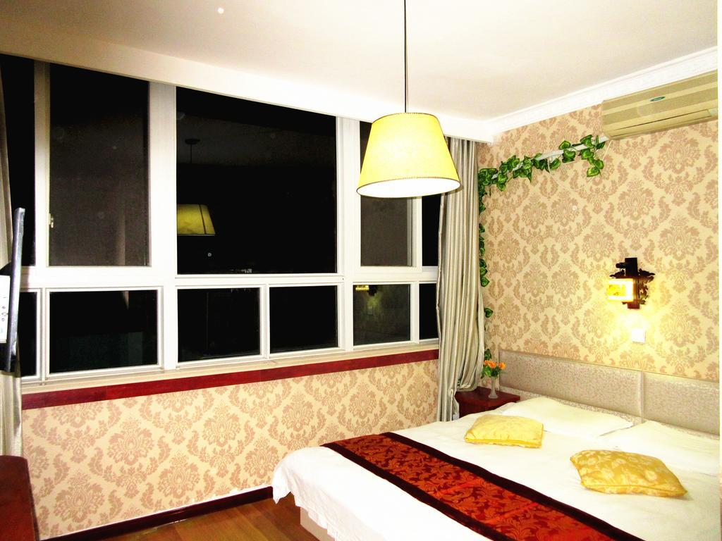 25°C Four Season Youth Hostel تشينغداو الغرفة الصورة